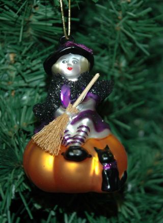 Blown Glass Halloween Witch On A Pumpkin Ornament