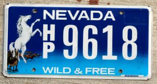 Nevada " Wild & " License Plate Featuring: Rearing Horse Running Wild Horses