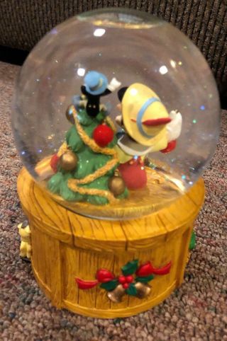 Disney Pinocchio Christmas Snow Globe Music Box Deck the Halls by Enesco 4