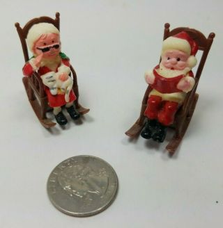 Miniature Santa And Mrs.  Claus In Rocking Chairs Plastic Small Figurines