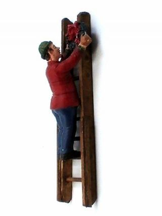 Christmas Village Accessories - Man/ladder Hanging Wreath Resin Figurine