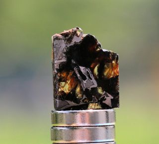 Admire Pallasite Meteorite,  1.  5 grams,  Kansas 2