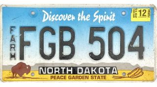 99 Cent 2015 North Dakota Farm License Plate Fgb504