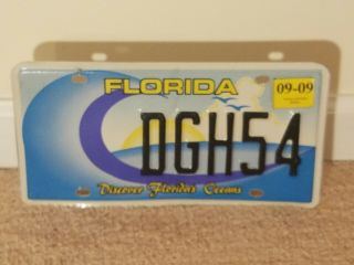 Florida Wave Discover Florida ' s Oceans license plate DGH54 stickered 2009 2