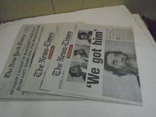 3 Saddam Hussein Caught Newspapers,  2003