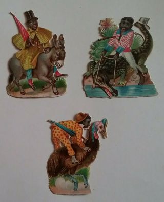 3 Antique Embossed Victorian Scraps.  Men Riding Unusual Animals.  App.  5x5cms
