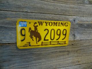 1987 Wyoming Cowboy License Passenger Plate Bucking Horse License Plate