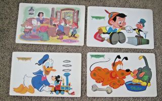 Set Of 4 Vtg Walt Disney Laminated Placemats 1960s Donald,  Pinocchio,  Snow White