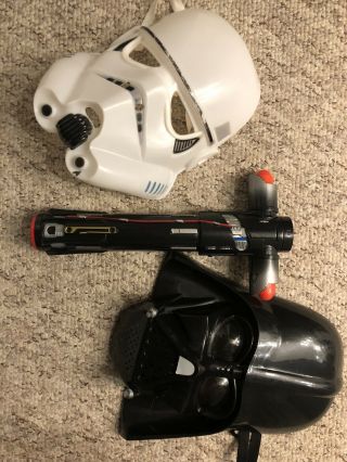 Darth Vader Mask,  Storm Trooper Mask And Red Lightsaber (plastic)