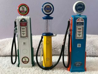 Road Signature Set Of 3 Metal Gas Pumps Ford,  Chevrolet,  & Eagle 1:18 Scale
