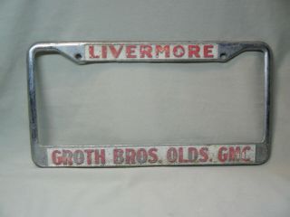 Vintage Groth Bros.  Olds.  Gmc Livermore California Dealer License Plate Frame