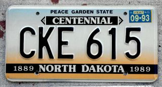 North Dakota Centennial License Plate 1889 - 1989 With A 1993 Sticker
