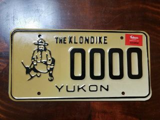 Yukon Sample License Plate " 0000 " The Klondike Gold Miner Expires 03/88