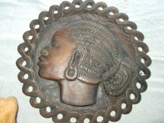 Black Folk Art - Hand Carved Wooden Disk Of Tne Head Of A Woman In Silhoutte