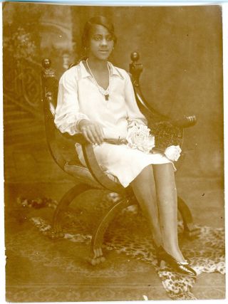 Vintage Photo Of An Elegantly Dressed Black Women Seated W/leopard Skin Rug