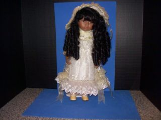 Vintage 14 Inch African American Porcelain Girl Doll