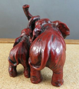Vintage Red Resin Faux Cinnabar Double Elephant Figurine Trunks Up Together 5