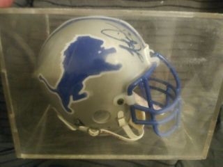 Detroit Lions Barry Sanders Signed Autographed Mini Helmet In Glass Casing.