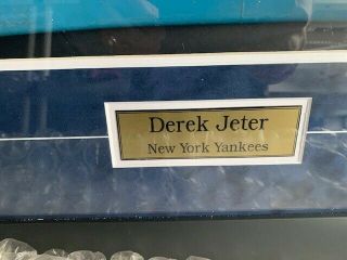 Derek Jeter signed Yankee stadium seat (2) and signed baseball shadowbox framed 5
