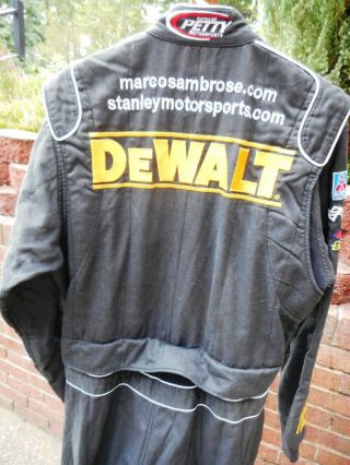 Marcos Ambrose DEWALT/Richard Petty Motorsports race worn driver ' s firesuit 10