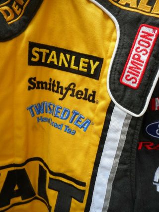 Marcos Ambrose DEWALT/Richard Petty Motorsports race worn driver ' s firesuit 4