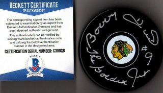 Beckett - Bas Bobby Hull " The Golden Jet " Autographed Chicago Blackhawks Puck 9028