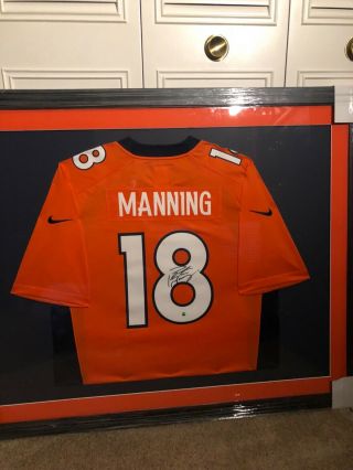 Signed/framed Peyton Manning Jersey