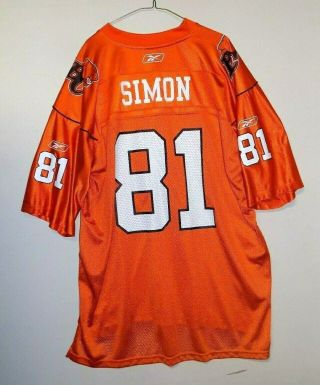 Vintage Geroy Simon Bc Lions 81 Orange Cfl Jersey By Reebok Man 