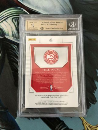18 - 19 National Treasures Trae Young Rookie Patch Auto RPA 02/99 BGS 9.  5/10 Hawks 2