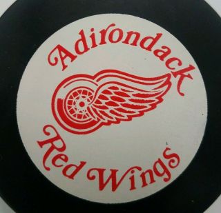 ADIRONDACK RED WINGS AHL INGLASCO MADE IN CANADA OFFICIAL GAME PUCK VINTAGE 2
