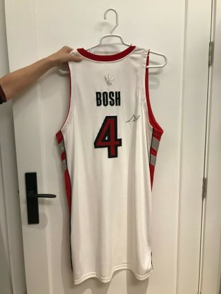 NBA Bosh Raptors Jersey - Authentic,  Game Worn,  and Signed,  Season ' 06 - ' 07. 3