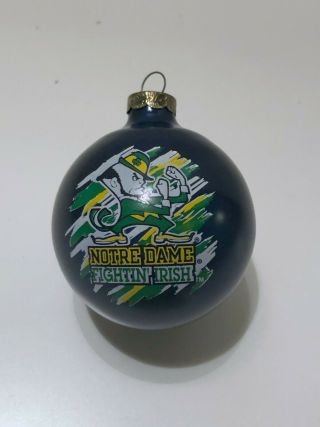 Notre Dame Fighting Irish Glass Ball Christmas Ornament Blue Green Gold White