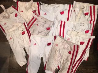 One (1) Authentic Game Worn Wisconsin Badgers Football Pants (assorted)