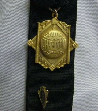 A.  G Spalding & Bros.  1920 Champion Gold Filled Base Ball Medal.