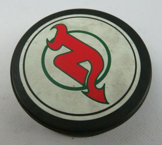 2 Vintage Hockey Game Official Puck Jersey Devils Nhl Trench Mfg Canada