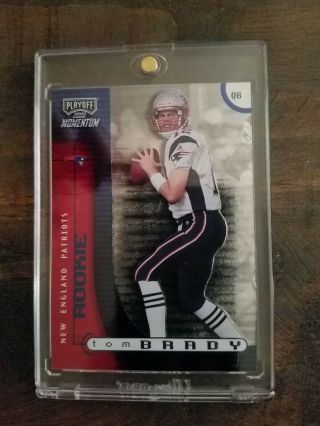 Tom Brady 2000 playoff momentum rookie card numbered 528/750 very limited. 2