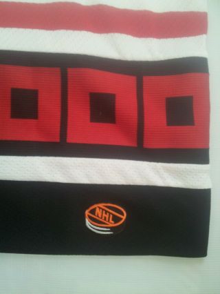 VINTAGE MADE IN CANADA CCM CAROLINA HURRICANES HOCKEY JERSEY IN SIZE XL 7