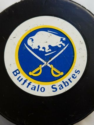 BUFFALO SABRES ZIEGLER VINTAGE GENERAL TIRE SLUG TRENCH GAME PUCK CANADA NHL 3