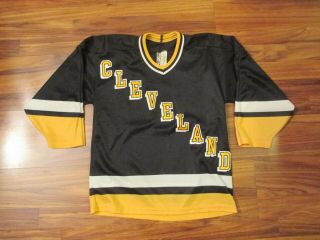 Vintage Bauer Black & Yellow Cleveland Lumberjacks Hockey Jersey - Youth L/xl