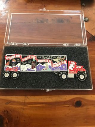2002 Salt Lake City Utah Winter Olympics Pin Set.  Coca Cola Employee Truck Set.