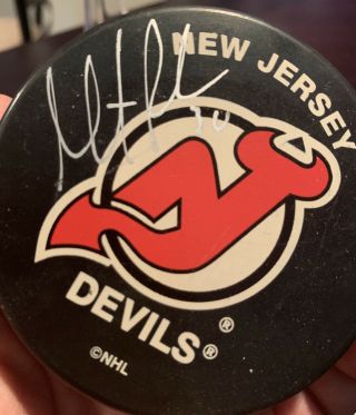 Martin Brodeur Autographed Puck Jersey Devils