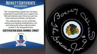 Beckett - Bas Bobby Hull " The Golden Jet " Autographed Chicago Blackhawks Puck 9027