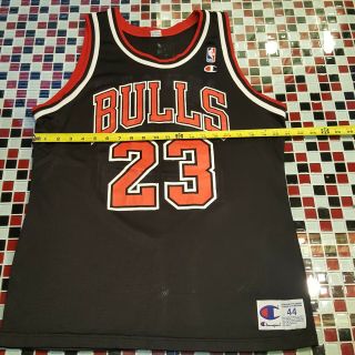 VTG 90 ' s Michael Jordan Chicago Bulls BLACK Basketball Jersey 23 Champion SZ 44 8