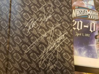 WWE Autographed Undertaker Memorabilia 3