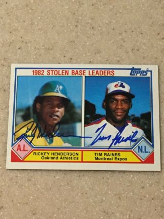 1983 Topps 704 Stolen Base Leaders Card Signed By Rickey Henderson / Tim Raines