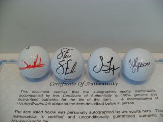 Four Autographed Golf Balls Jon Rahm Steve Stricker Jason Dufner Webb Simpson