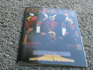 1984 Los Angeles Rams Yearbook.  Signed By John Robinson,  Vice Ferragamo,  Etc.