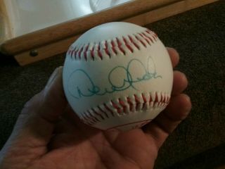 Derek Jeter signed Yankee baseball with ball & card case. 7