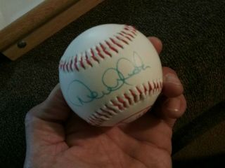 Derek Jeter signed Yankee baseball with ball & card case. 8