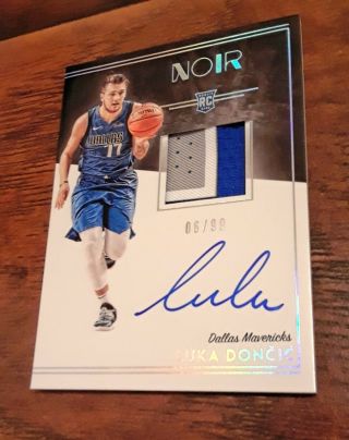 Luka Doncic Noir Auto Rookie Autograph Jersey $500.  00,  Only 99 Exist On Card